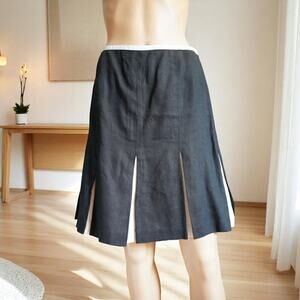 Sophisticated Black Linen Pleated Skirt with Crisp White Contrast - Timeless Ele